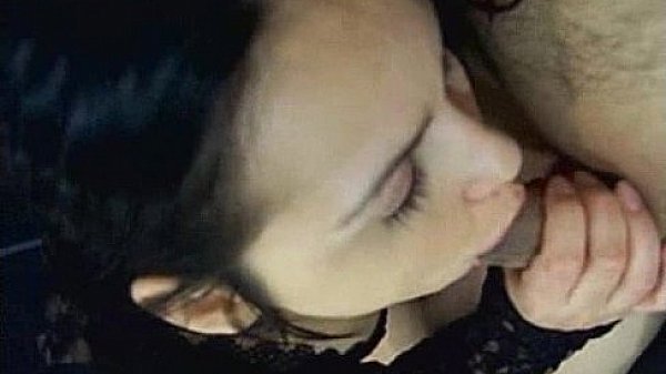 Amateur brunette with big tits sucks cock