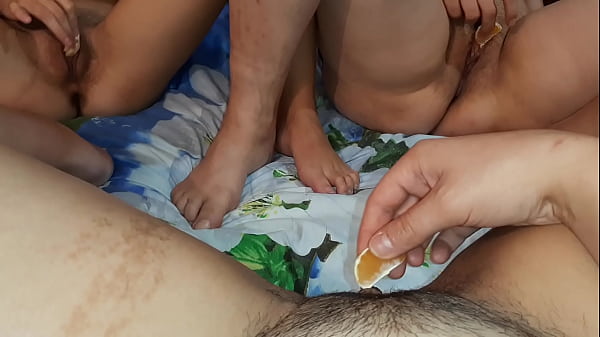 Girls masturbate pussies with tangerines and cum  