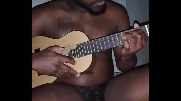 Translating other meanings of horns in the air while singing and playing guitar naked