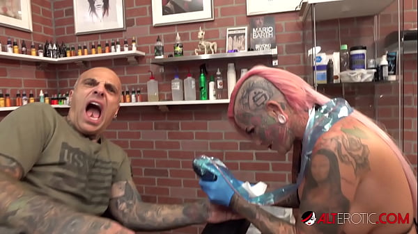 Inked up babe tattoos her friend then lets him stuff her cunt  