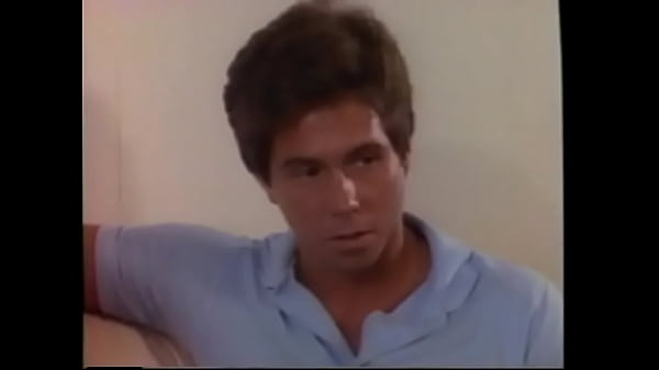 Smart guy knows how to suck advantage out of stained glass of red on ermine white dress of charming fair-haired guest