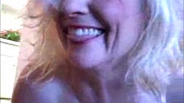 MILF SMOKES LEG OPEN