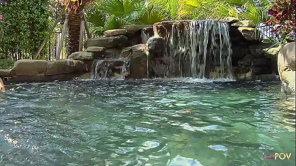 Sliding a glass dildo up her lovers pussy to have a sensational lesbian intercourse