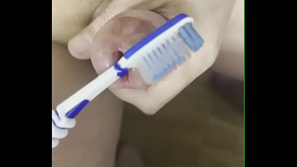 cockstuffing deep with toothbrush  