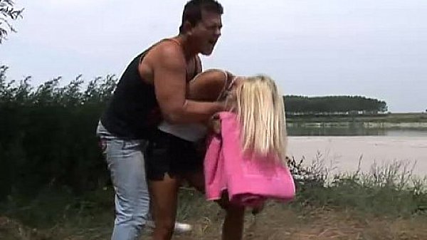 Tanned blonde riverside adventure