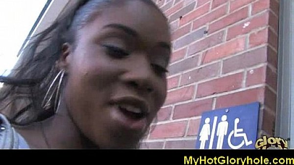 Black lady sucks white cock through a gloryhole 5