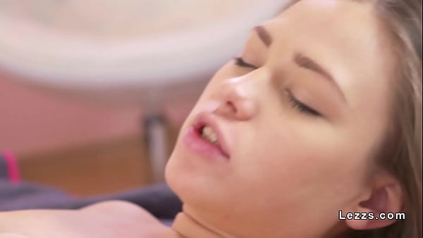 Blonde lesbians licking in bathroom