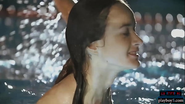 Tiny Russian teen babe Vi Shy swims naked in a pool 