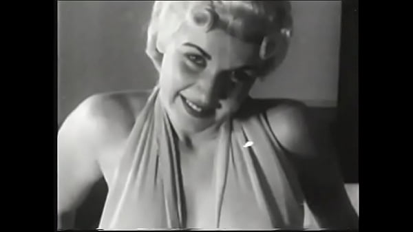 Sexy blonde takes off her underwear and shows beautiful breasts