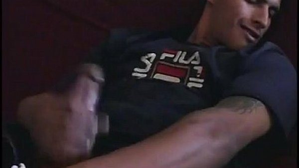 Hot and horny latino gay jerking off his big cock in front of cam