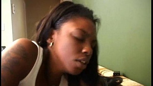 Big black ass rides strap on