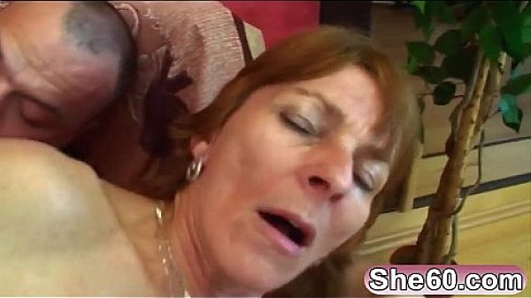 Busty brunette granny Ivet takes cock on couch