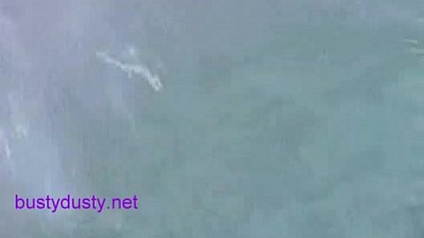 Busty Dusty playing in the hot tub