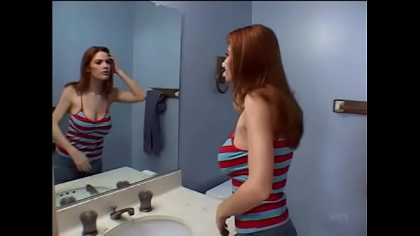 Hot redhead  Roxetta gets wild double penetration and gooey facial cumshot.