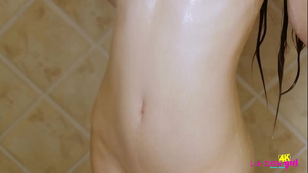 Gorgeous sexy model caress her body in the shower