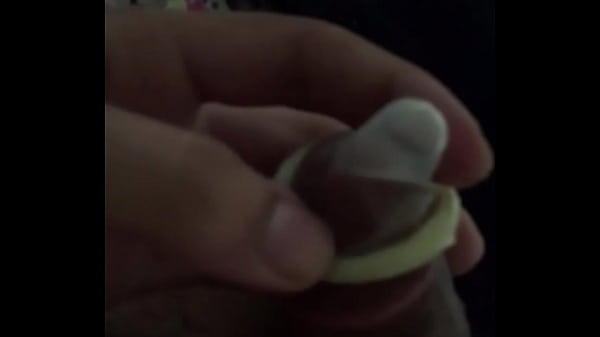 Wearing condom by indian boy