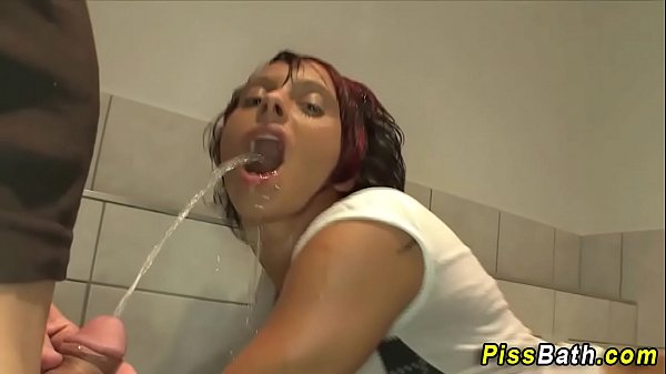 Whore gets golden shower