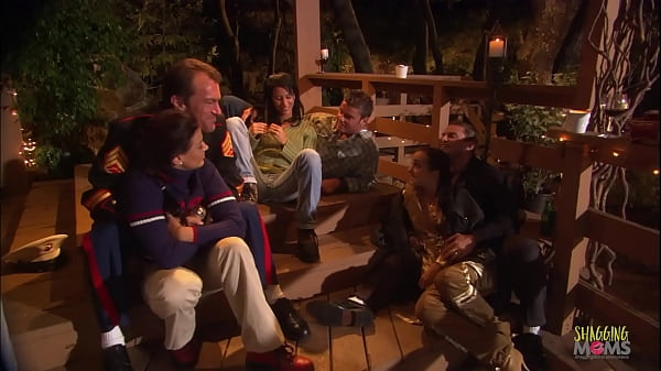 Her body is twisting and turning as the guy thrusts his dick into her holes  