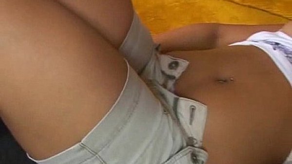 Foxy brunette tranny babe tugging on her stiff dick