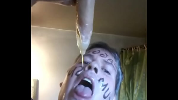 Faggot dripping with loads of cum from a condom  