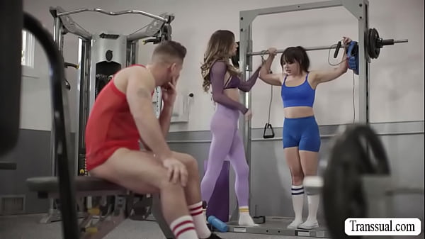 TS Jade Venus caught her friend sucking cock of their gym instructor.After that,she ties up her friend and lets her watch while shes sucking instructors big cock.After that,she lets him lick and fuck her wet ass so hard. 