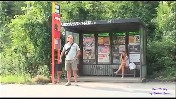 At the bus stop, the slut really wants to fuck with a stranger
