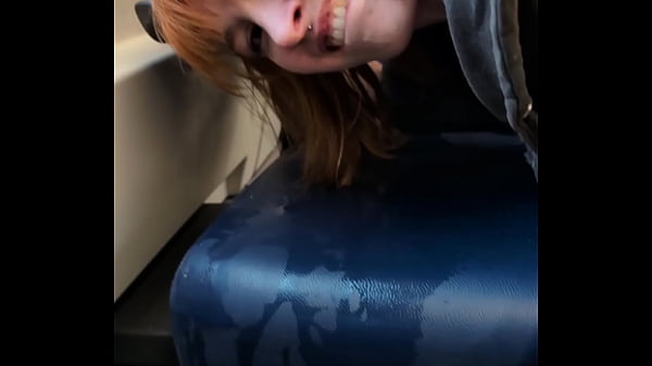 Pixie Pink Public Pissing and Squirting in a Busy Train During the Day