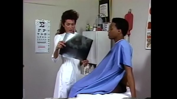 Doctor gets horny for her patient and rides on his cock to fuck her ass