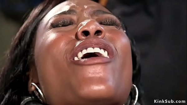 Master vibrates pussy to ebony sub Chanell Heart while she is hanged for ankles in upside down bondage then in metal device bangs her pussy
