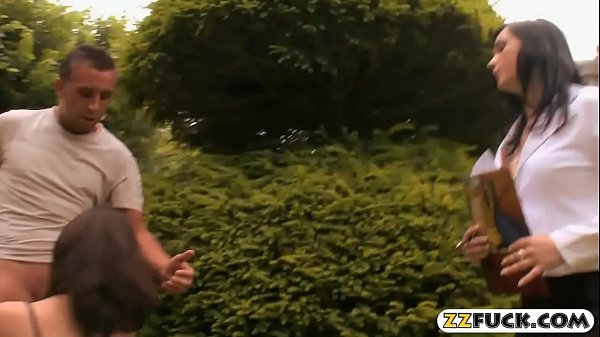 Two lusty women get fucked in the ass in the bedroom