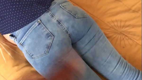 After masturbating, the beautiful stepmother puts on her jeans and asks me to cum in her big ass