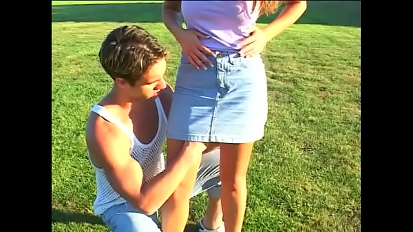 Blonde gives blowjob outdoors  