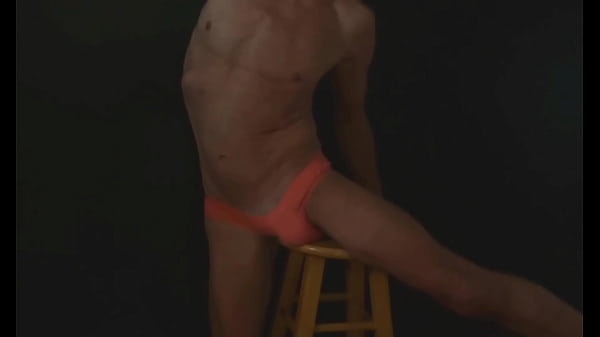 Part 2 - Down in the Dark - sneak a peek preview - Groin Stretching on the Stool with Dark Background and Bright Briefs - with the light off  
