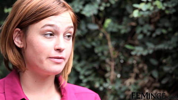 a redhead co-ed fingering her girlfriend