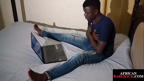 Nubian twink wanking his uncut dong indoors