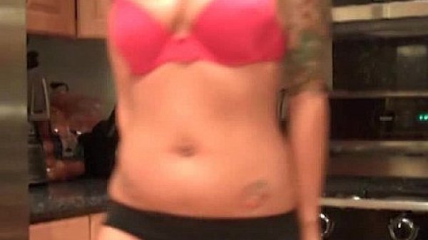 Sexy stripteasing emo in the kitchen