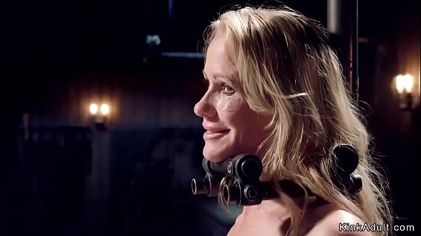 Gagged blonde Milf gets tormented in dark dungeon