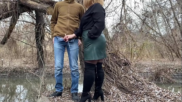 Mother-in-law holds my dick while I pee outdoors