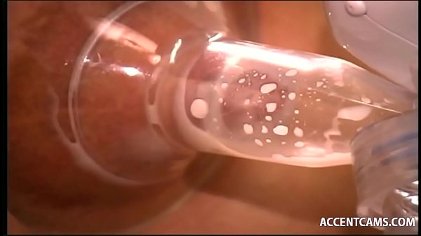 Busty Dark Nippled Brunette Uses Breast Pump To Make Milk Flow From Her Nips