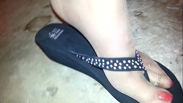 me in the garage displaying my beautiful feminine feet in sheer taupe pantyhose and thong sandals  