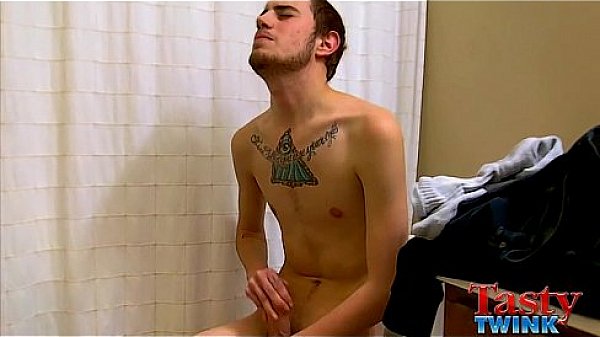 Inked twink stuffs fleshlight with cock 