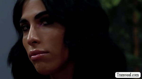 Brunette shemale shows how her tits is done and how its big it is in the gym