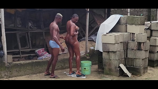 African mummy was bathing and her neighbor came to peep at her and they fucked hard