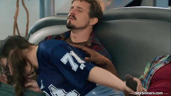 Stepdaughter Leana Lovings sits between her stepdads two friends and starts to jerk them off behind his back.The petite teen rides a big black cock  