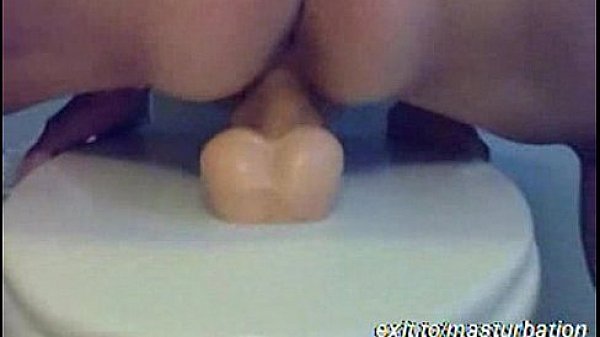 A woman of 50 years in the bathroom with a dick fucking artificial  