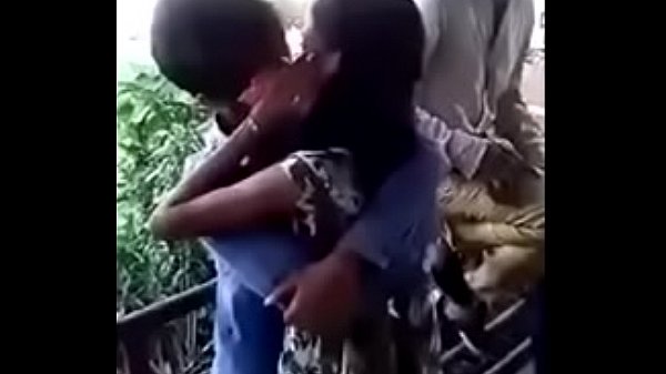 College couples enjoying a romantic kiss at the lovers point