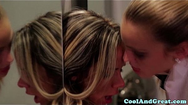 Busty lesbian strapon fucked in restroom