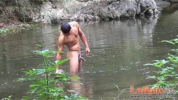 Spicy boys having oral foreplay on the rocky bank