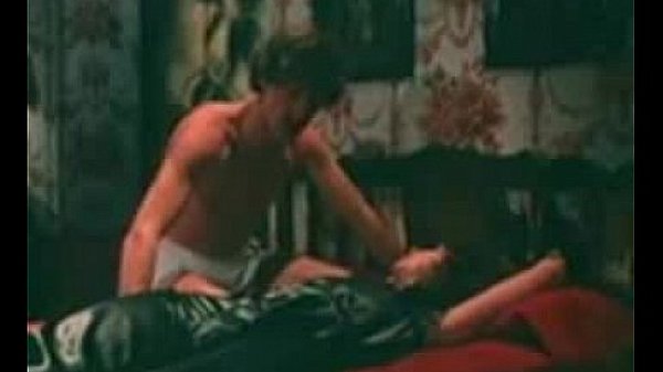 Hot Intruder is handcuffed and fucked by John Holmes