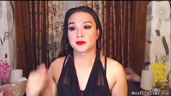 Sexy brunette Asian amateur babe in black outfit with full make up and big ear rings posing and chatting with her users in private webcam show  